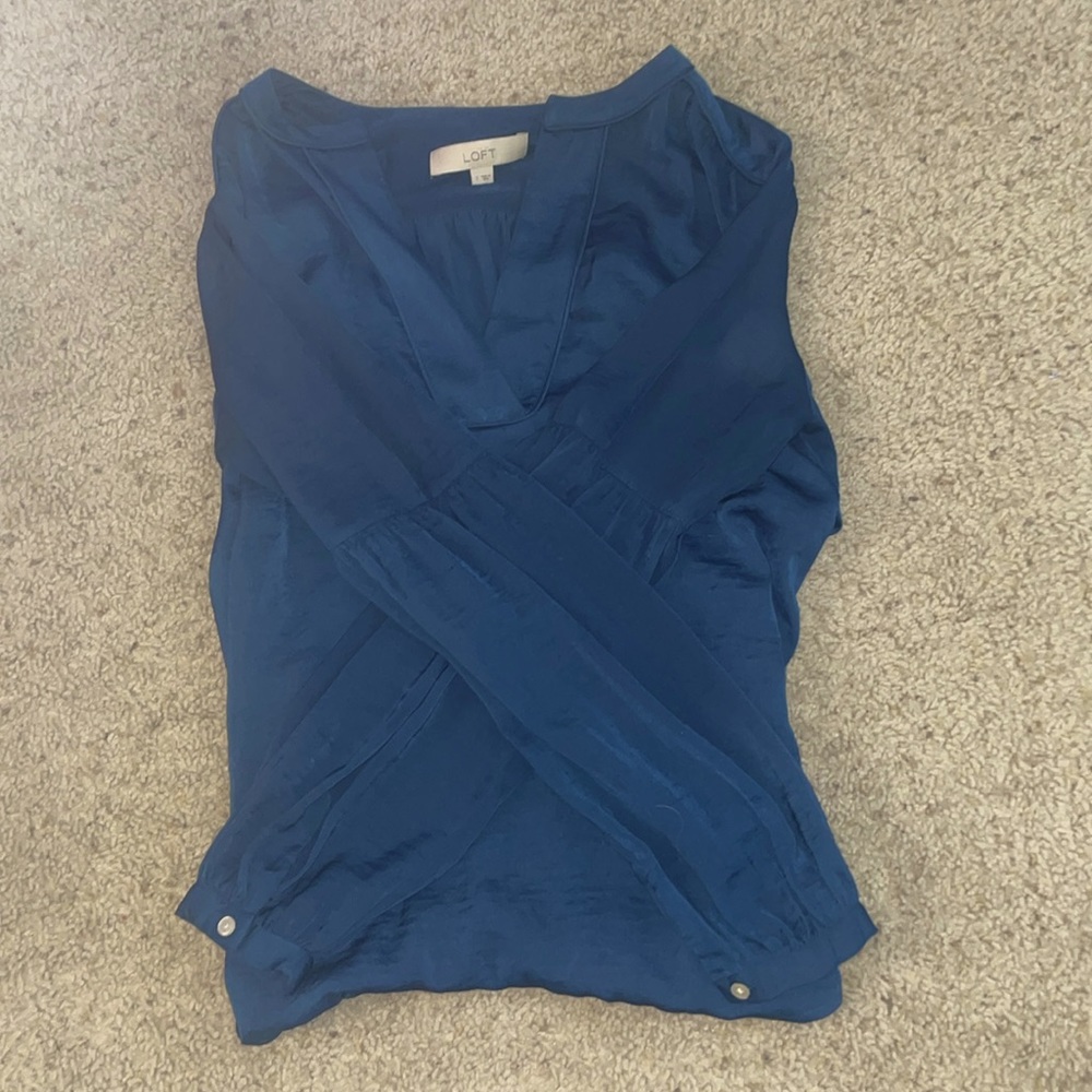 Blue long sleeves blouse with v neck and button on sleeves size small brand LOFT